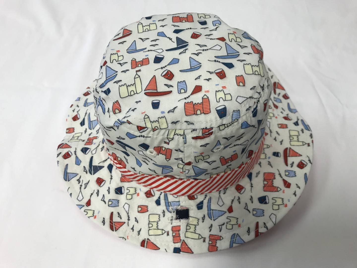 SUNNY DAYZ REVERSIBLE BOATS HAT SIZE 12-24 MONTHS