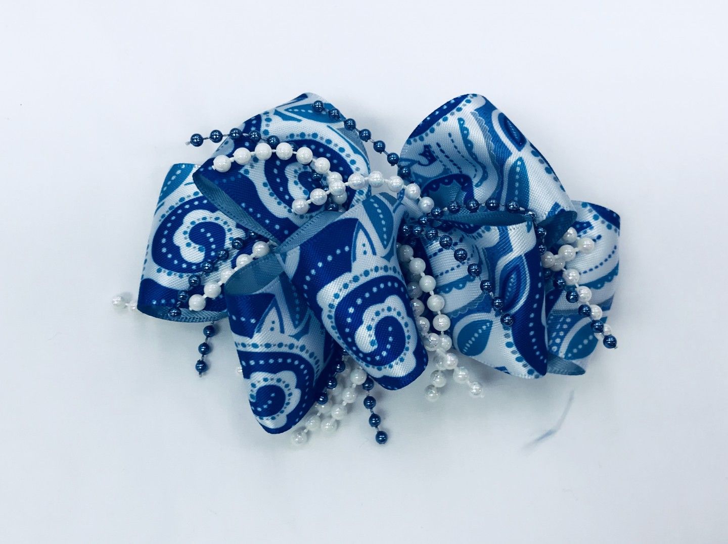 CHEE CHEE BLUE PATTERNED BOW WITH BEADS